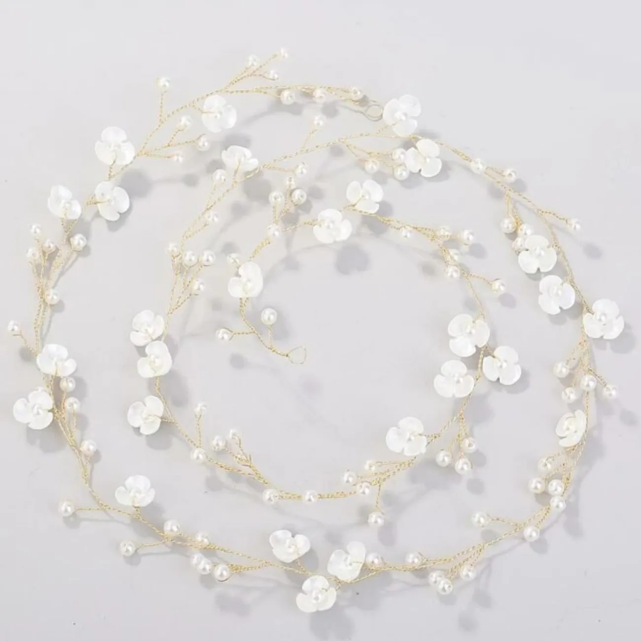 Faux white pearl flower hair accessory