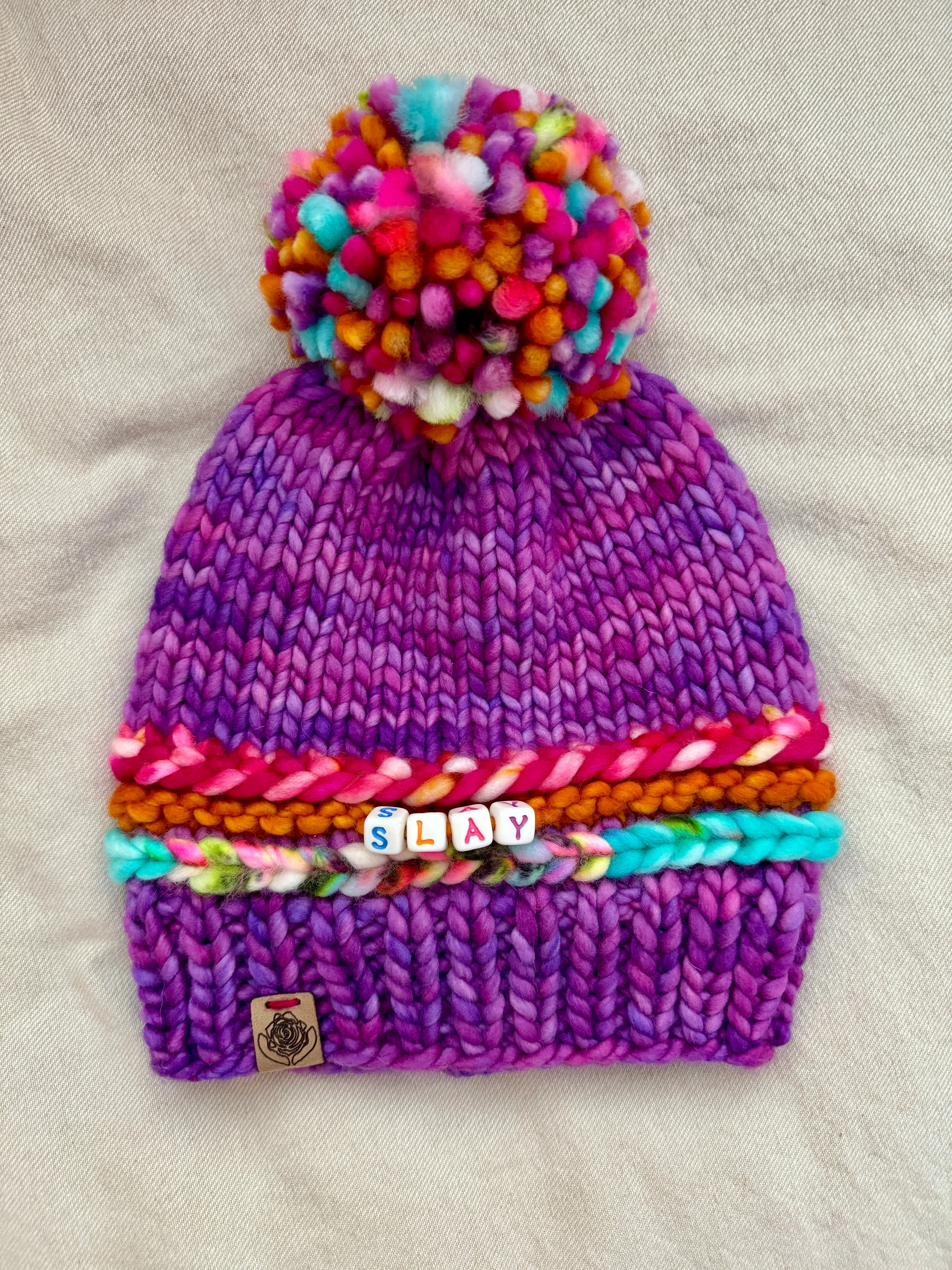 Luxury women's hand knit winter pom beanie slay purple pink teal bright fun color wool slow fashion gift